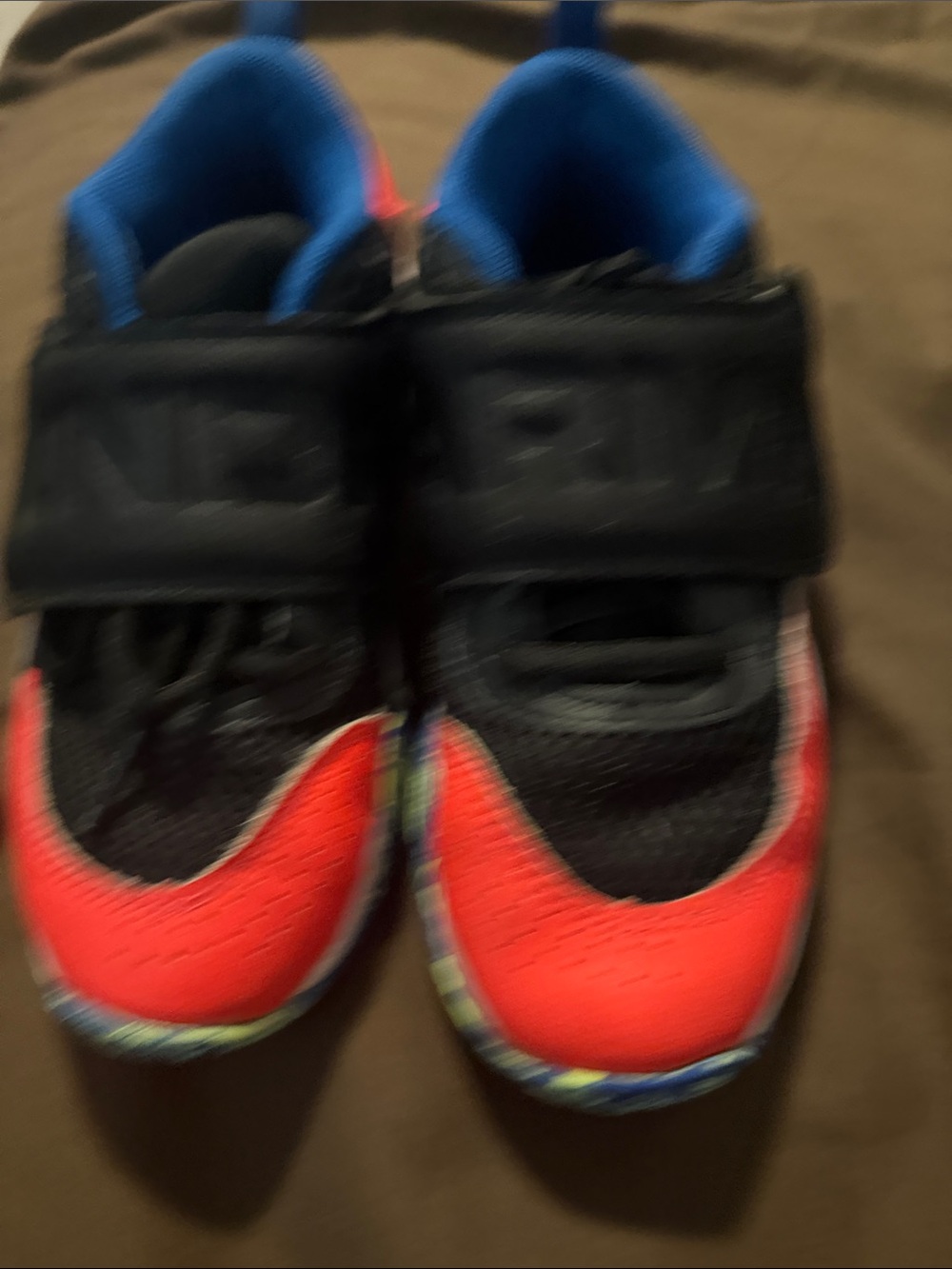 Under Armour Kids Black and Orange Sneakers